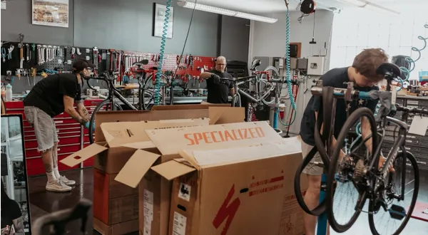 Our workshop team boxing bikes ready for shipping